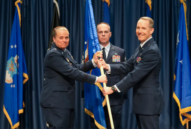U.S. Air Force Lt. Gen. Linda Hurry, commander of Air Force Materiel Command, passes the guidon to U.S. Air Force Brig. Gen. Douglas Wickert during the Air Force Research Laboratory change of command ceremony at the National Museum of the U.S. Air Force, Wright-Patterson Air Force Base, Ohio, June 3, 2026